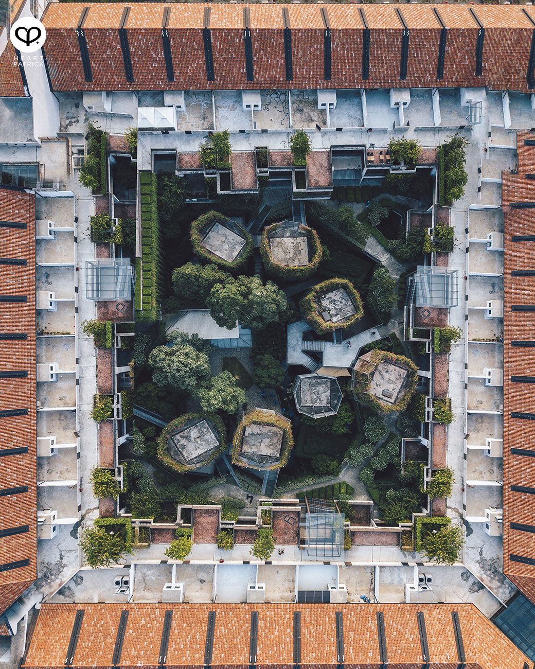 Aerial view of Tamarind Square, Cyberjaya: a courtyard garden framed by terracotta-roofed blocks